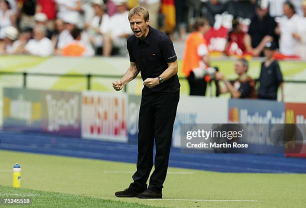 Manager of Germany Juergen Klinsmann shouts instructions from the touchline during the FIFA World Cup Germany 2006 Group A match between Ecuador and...