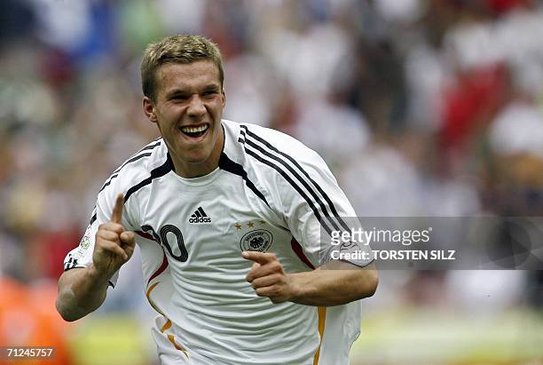 German forward Lukas Podolski celebrates after scoring the 0-3 against Ecuador during the World Cup 2006 group A football match Ecuador vs Germany,...