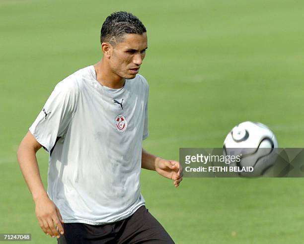 Tunisian defender Anis Ayari controls a ball during a training session at Saks Stadium in Schweinfurt, 20 June 2006. Tunisia will play their final...