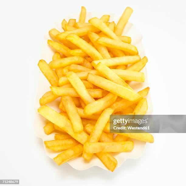 french fries, close-up, elevated view - french fries white background stock-fotos und bilder