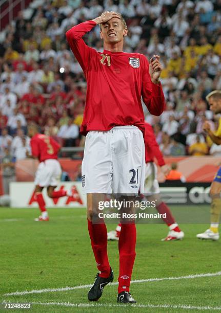 Peter Crouch of England misses a chance on goal during the FIFA World Cup Germany 2006 Group B match between Sweden and England at the Stadium...