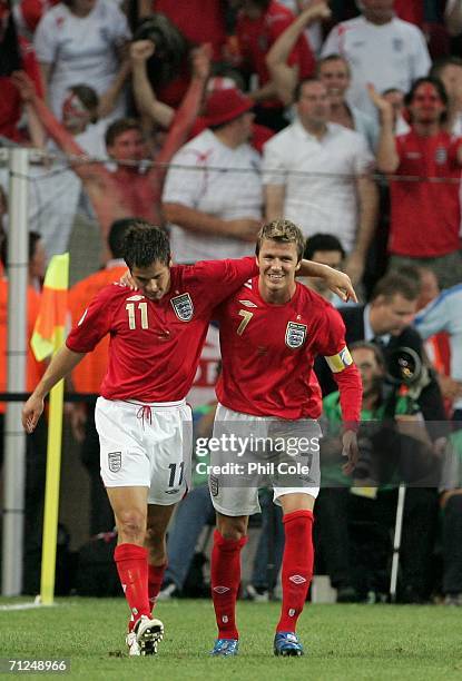 Joe Cole of England celebrates scoring a goal with David Beckham of England during the FIFA World Cup Germany 2006 Group B match between Sweden and...