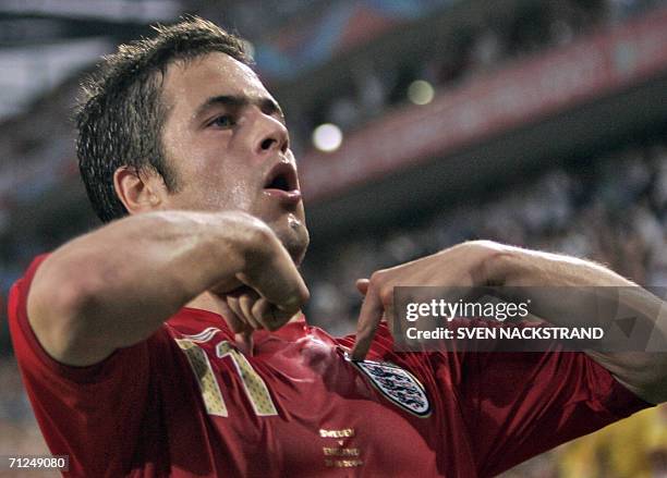 English midfielder Joe Cole celebrates after scoring during the opening round Group B World Cup football match Sweden vs. England, 20 June 2006 in...
