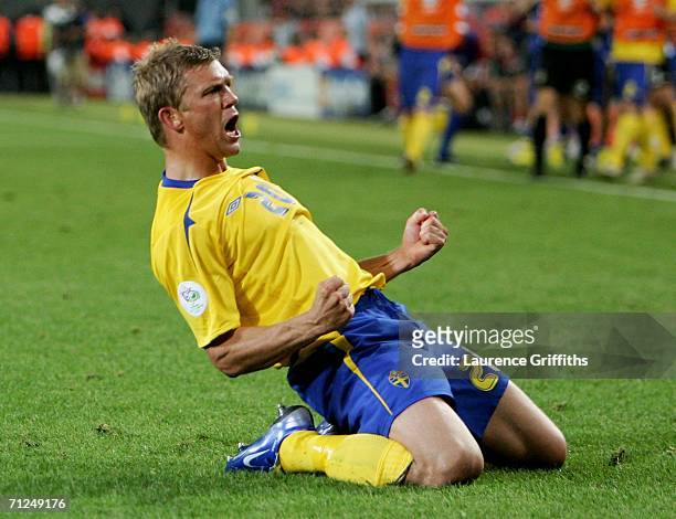 Marcus Allback of Sweden celebrates scoring a goal during the FIFA World Cup Germany 2006 Group B match between Sweden and England at the Stadium...