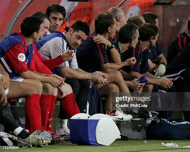 Frustrated Wayne Rooney of England sits on the bench after being substituted during the FIFA World Cup Germany 2006 Group B match between Sweden and...