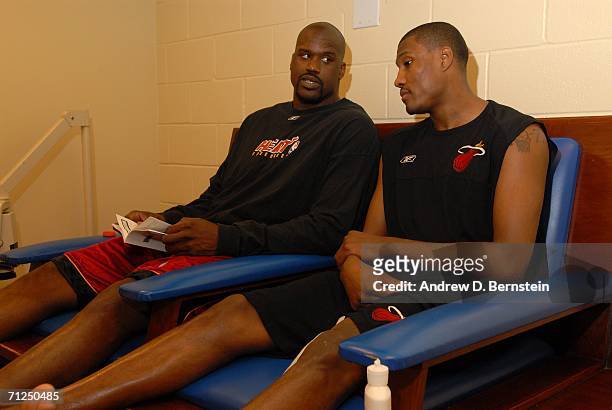 Shaquille O'Neal and James Posey of the Miami Heat sit in the locker room prior to the start of Game Six of the 2006 NBA Finals against the Dallas...