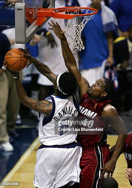 Udonis Haslem of the Miami Heat goes up for a block on Marquis Daniels of the Dallas Mavericks in the first half of game six of the 2006 NBA Finals...