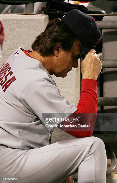Manager Tony LaRussa of the St. Louis Cardinals reacts in the dugout as the Chicago White Sox put up 20 runs in 7 innings on June 20, 2006 at U.S....