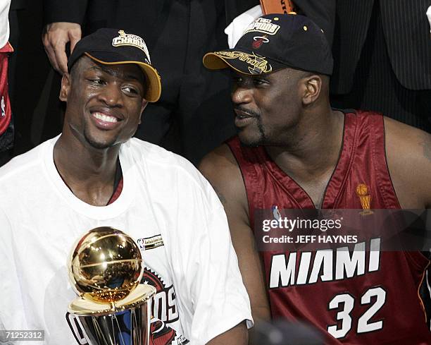 Dallas, UNITED STATES: Dwyane Wade and Shaquille O'Neal of the Miami Heat celebrate after winning the NBA Finals against the Dallas Mavericks in Game...