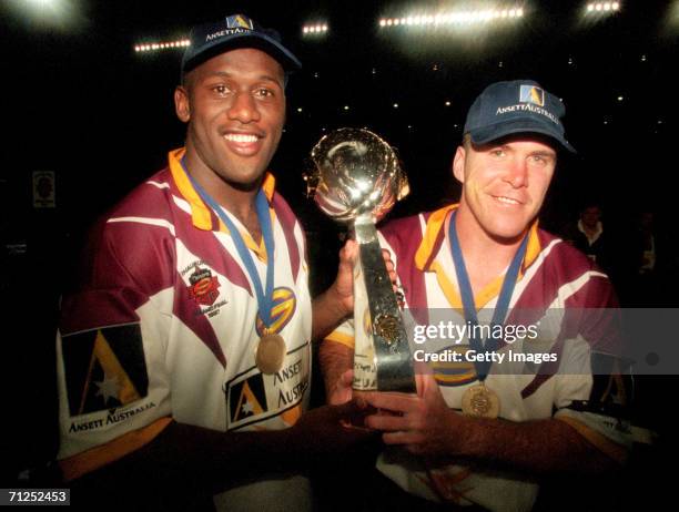 Wendell Sailor and Darren Smith of the Broncos celebrate victory after the Super League Grand Final between the Brisbane Broncos and the Cronulla...