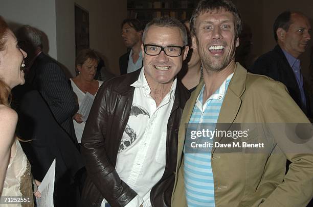Damien Hirst and Bez Berry attend Hirst's: 'A Thousand Years and Triptychs' private view at the Gagosian Gallery on June 20, 2006 in London, England.