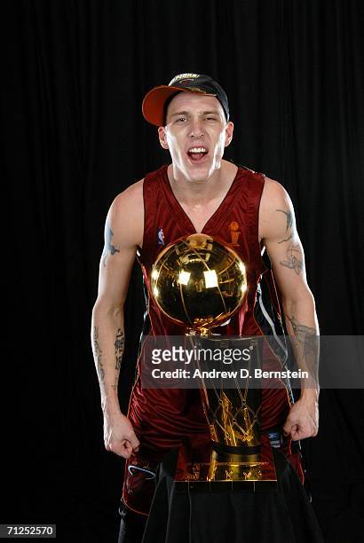 Jason Williams of the Miami Heat poses for a portrait with the Larry O'Brien Championship trophy after their Game Six victory of the 2006 NBA Finals...