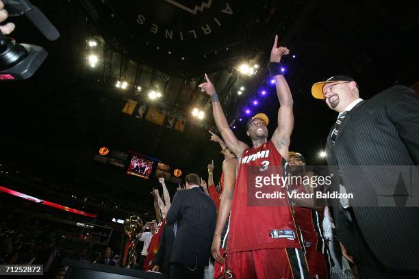 Finals MVP Dwyane Wade of the Miami Heat celebrates winning the NBA Championship after the Heat beat the Dallas Mavericks 95-92 in Game Six of the...