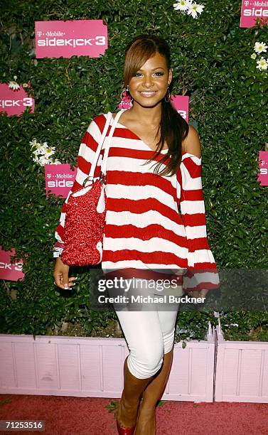 Singer Christina Milian arrives at the launch of the T-Mobile Sidekick 3 at the Hollywood Palladium on June 20, 2006 in Los Angeles, California.