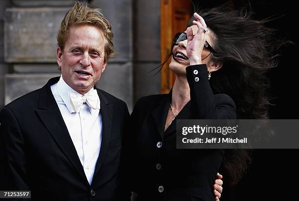 Michael Douglas and his wife Catherine Zeta Jones arrive at St Andrews University where he is receiving a honorary degree on June 21,2006 in St...