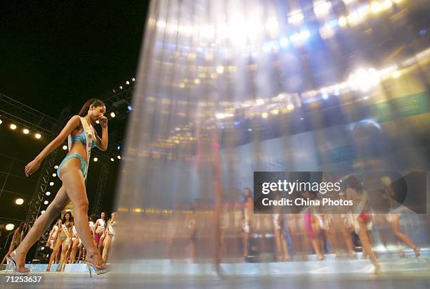 Contestants perform at the "Miss Bikini of the World" contest of the 2006 Miss Tourism Queen International pageant on June 1, 2006 in Beijing, China....