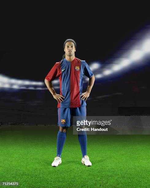 In this photo-montage handout image provided by Nike, Ronaldinho of FC Barcelona reveals the new home kit for the 2005/06 season on June 21, 2006 in...
