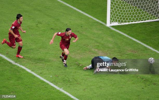 Maniche of Portugal celebrates after scoring the first goal of the game during the FIFA World Cup Germany 2006 Group D match between Portugal and...