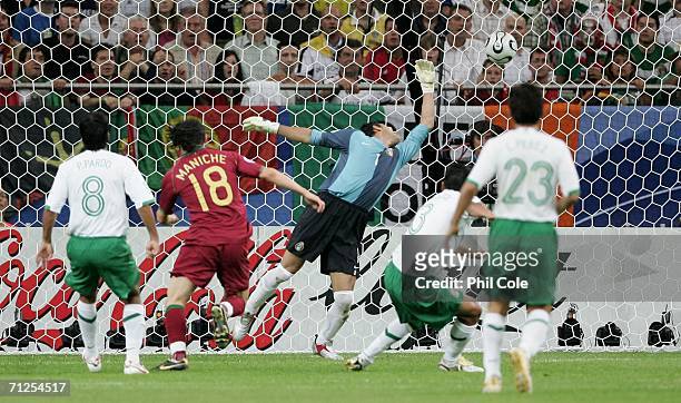 Maniche of Portugal shoots and scores the first goal of the game past goalkeeper Oswaldo Sanchez of Mexico during the FIFA World Cup Germany 2006...