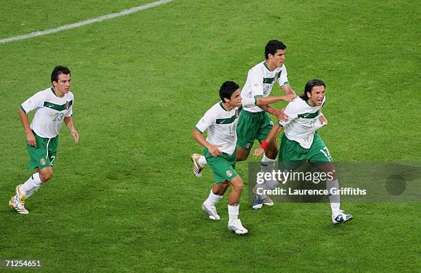 Jose Fonseca of Mexico celebrates scoring their first goal of the game during the FIFA World Cup Germany 2006 Group D match between Portugal and...