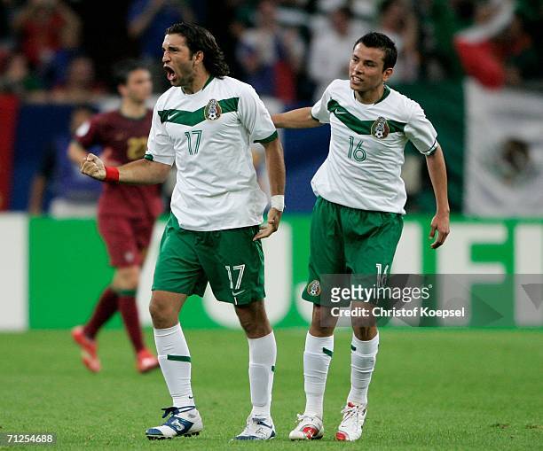Jose Fonseca of Mexico celebrates scoring their first goal of the game during the FIFA World Cup Germany 2006 Group D match between Portugal and...