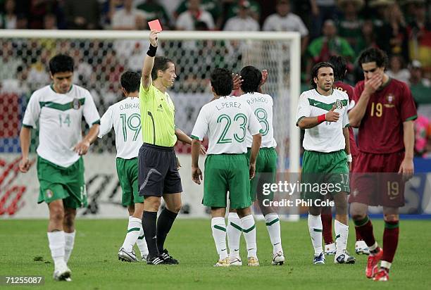 Luis Perez of Mexico is shown second yellow card and is sent off by referee Lubos Michel during the FIFA World Cup Germany 2006 Group D match between...