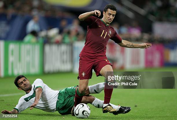 Sabrosa Simao of Portugal is tackled Zinha of Mexico during the FIFA World Cup Germany 2006 Group D match between Portugal and Mexico at the Stadium...