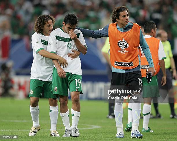 Omar Bravo of Mexico looks dejected after losing the FIFA World Cup Germany 2006 Group D match between Portugal and Mexico 2-1 at the Stadium...