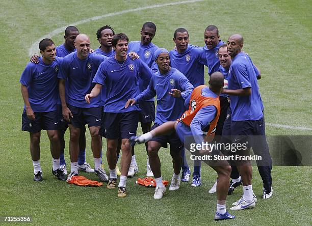 Adriano of Brazil pretends to make a fight with team mates during the training session of National Football Team Brazil on June 21, 2006 in Dortmund,...