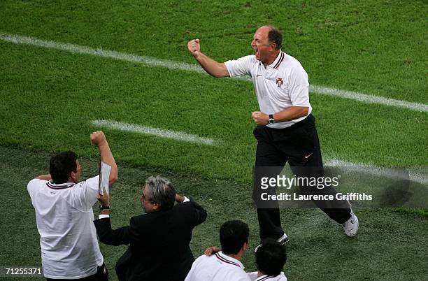 Portugal coach Luiz Felipe Scolari celebrates on the sidelines after his team won the FIFA World Cup Germany 2006 Group D match between Portugal and...
