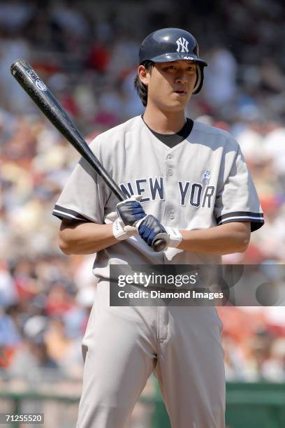 Pitcher Chien-Ming Wang, of the New York Yankees, at bat during a game on June 18, 2006 against the Washington Nationals at RFK Stadium in...