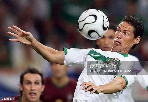 Gelsenkirchen, GERMANY: Mexican forward Guillermo Franco eyes the ball during the World Cup 2006 group D football game Portugal vs. Mexico, 21 June...