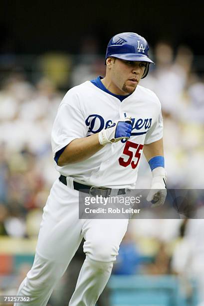 May 21: Russell Martin of the Los Angeles Dodgers runs during the game against the Los Angeles Angels of Anaheim at Dodger Stadium in Los Angeles,...