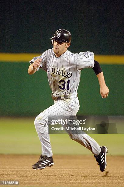 Cory Sullivan of the Colorado Rockies runs to third base during a baseball game against the Washington Nationals on June 12, 2006 at RFK Stadium in...