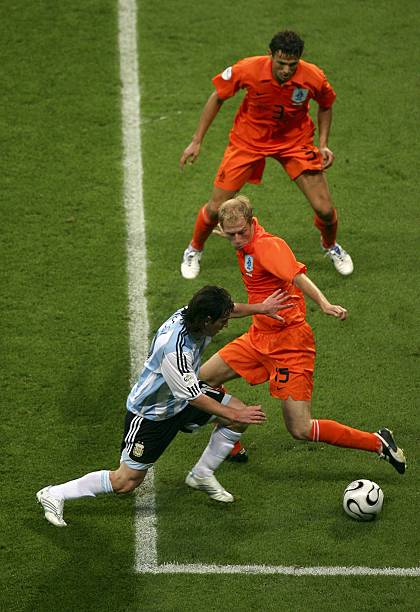 Lionel Messi of Argentina attempts to go past Tim De Cler of the Netherlands during the FIFA World Cup Germany 2006 Group C match between Netherlands...
