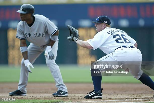 Robinson Cano of the New York Yankees leads off first base during the game against the New York Yankees at Comerica Park in Detroit, Michigan on May...