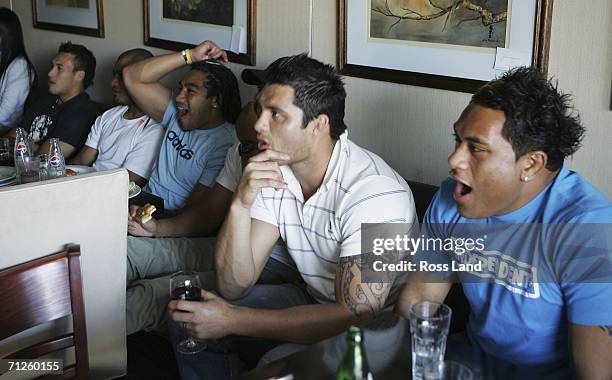 All Blacks Rico Gear, Sam Tuitupou, Ma;a Nonu, Troy Flavell and Neemia Tealata relax in a local bar as they watch the World Cup Football match...