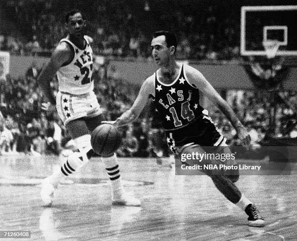 Bob Cousy of the Eastern Conference All-Stars drives to the basket during an NBA All-Star game circa 1950. NOTE TO USER: User expressly acknowledges...