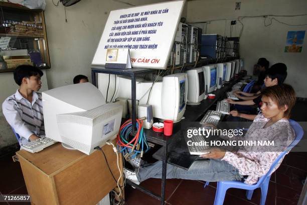 Youngsters play online games at an Internet shop in downtown Hanoi 21 June 2006. Communist Vietnam is cracking down on a new social evil, medieval...