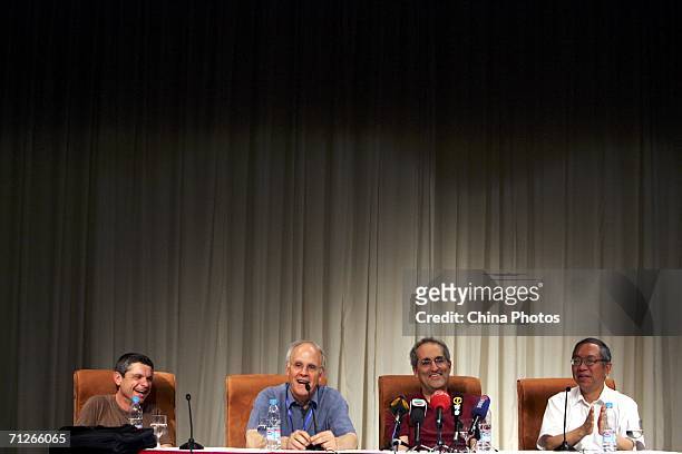 Physicists Andrew Strominger, David Gross, E.Witten, Chinese mathematician Shing-Tung Yau, a professor at Harvard University attend a question and...