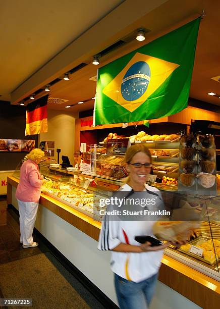 Local backery displays the flags from germany and Brazil before the Brazil National Football Team training session for the FIFA World Cup Germany...