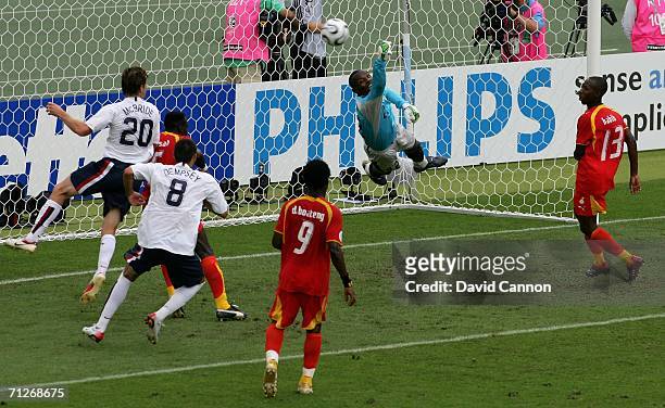 Richard Kingston of Ghana saves from Brian McBride of USA during the FIFA World Cup Germany 2006 match between Ghana and USA played at the Stadium...