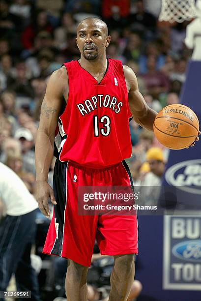 Mike James of the Toronto Raptors moves the ball against the New Orleans/Oklahoma City Hornets on April 7, 2006 at the Ford Center in Oklahoma City,...