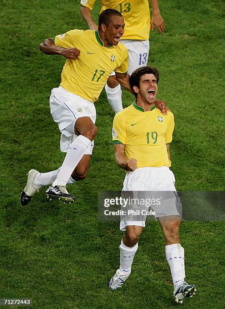 Juninho Pernambucano of Brazil celebrates scoring a goal with Gilberto Silva during the FIFA World Cup Germany 2006 Group F match between Japan and...