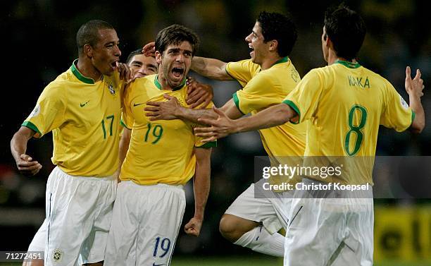 Juninho Pernambucano of Brazil celebrates scoring a goal with his team mates during the FIFA World Cup Germany 2006 Group F match between Japan and...