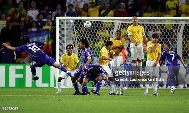 Shunsuke Nakamura of Japan has a shot on goal during the FIFA World Cup Germany 2006 Group F match between Japan and Brazil at the Stadium Dortmund...