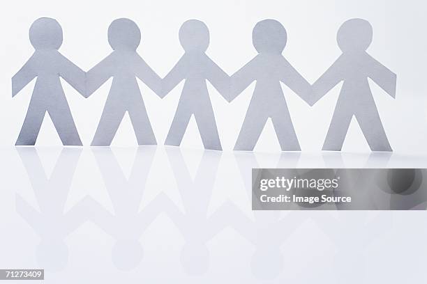 paper chain people - human chain stock pictures, royalty-free photos & images