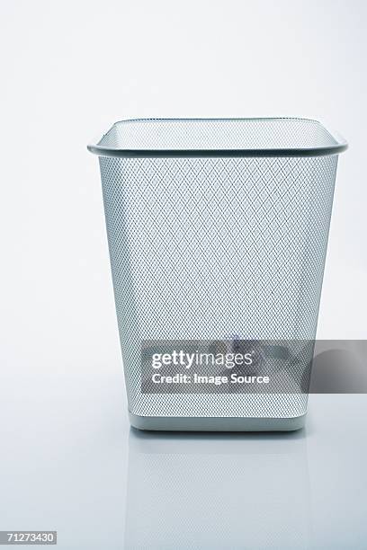 crumpled paper in the bin - waste basket stock pictures, royalty-free photos & images