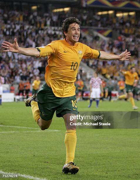 Harry Kewell of Australia turns away to celebrate, after scoring his team's second goal to level the scores at 2-2 during the FIFA World Cup Germany...