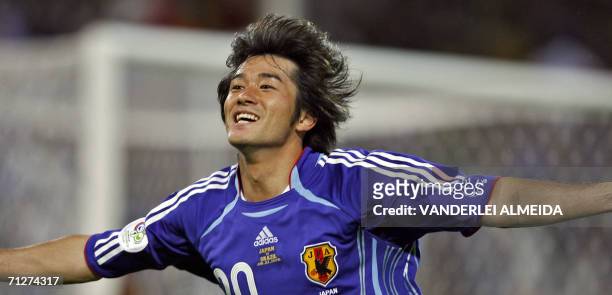 Japanese forward Keiji Tamada celebrates after scoring during the opening round Group F World Cup football match Japan vs. Brazil, 22 June 2006 in...